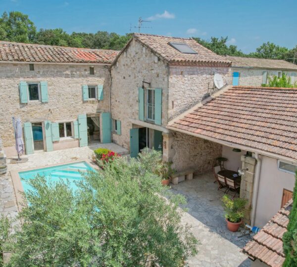 Stone village house with courtyard and pool