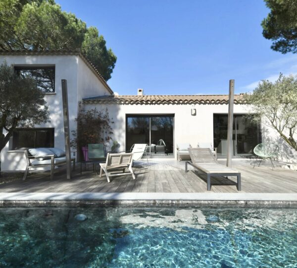 Contemporary villa with pool and wooded garden